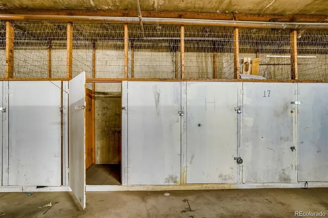 a view of swimming pool with outdoor seating and trees