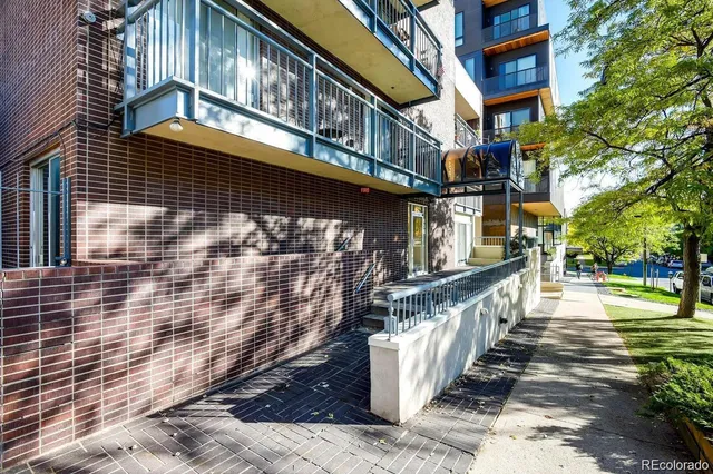 a city street lined with tall buildings