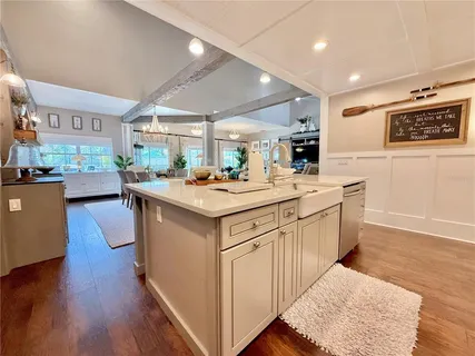a bathroom with a tub and a shower