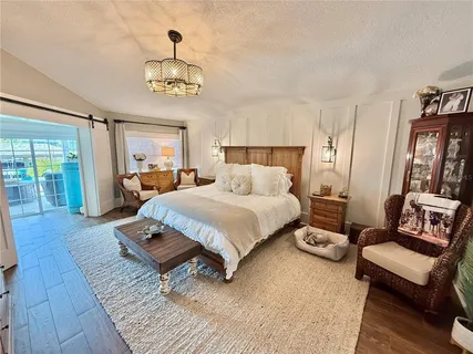 a en suite spacious bathroom with a double vanity sink a mirror and a shower