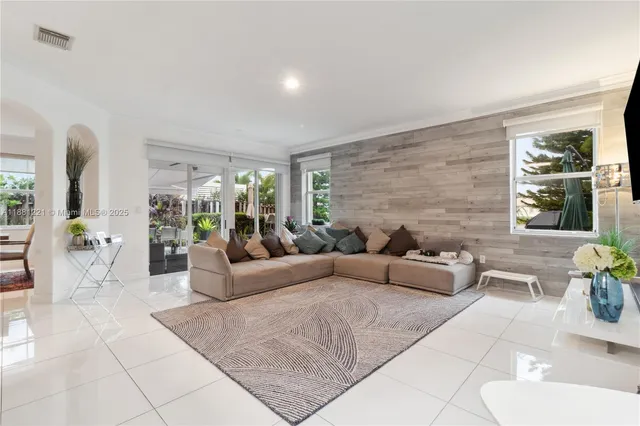 a kitchen with cabinets stainless steel appliances and a counter space
