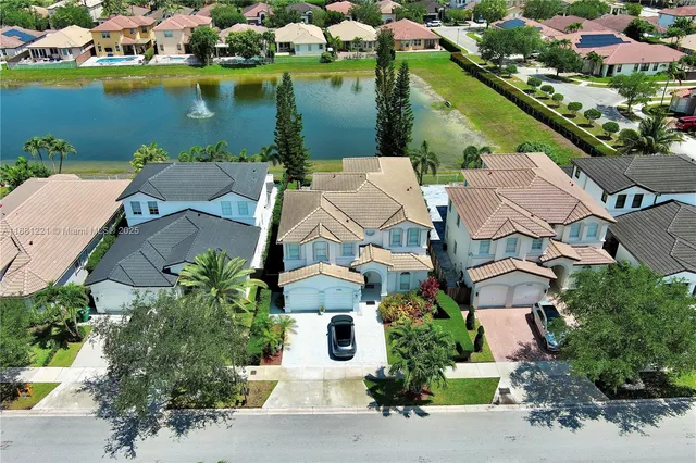 a view of a yard from a balcony
