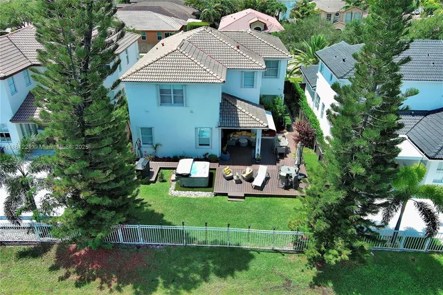 a view of a swimming pool with a lounge chairs