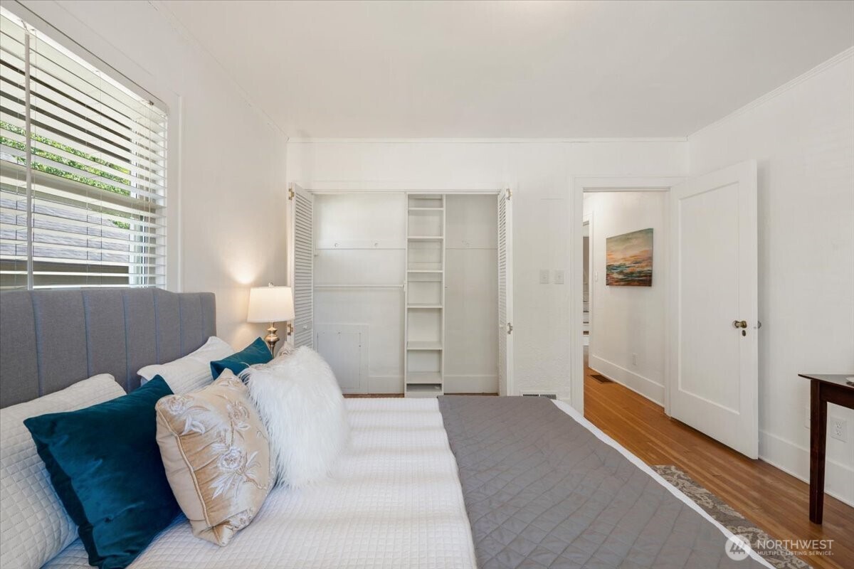 4837 South I Street Tacoma, WA 98408 - Photo 15 of 40 a bedroom with a bed and a window