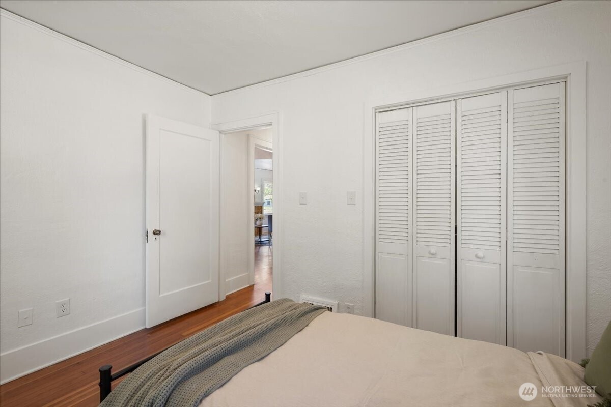 4837 South I Street Tacoma, WA 98408 - Photo 19 of 40 a bedroom with a bed and a window