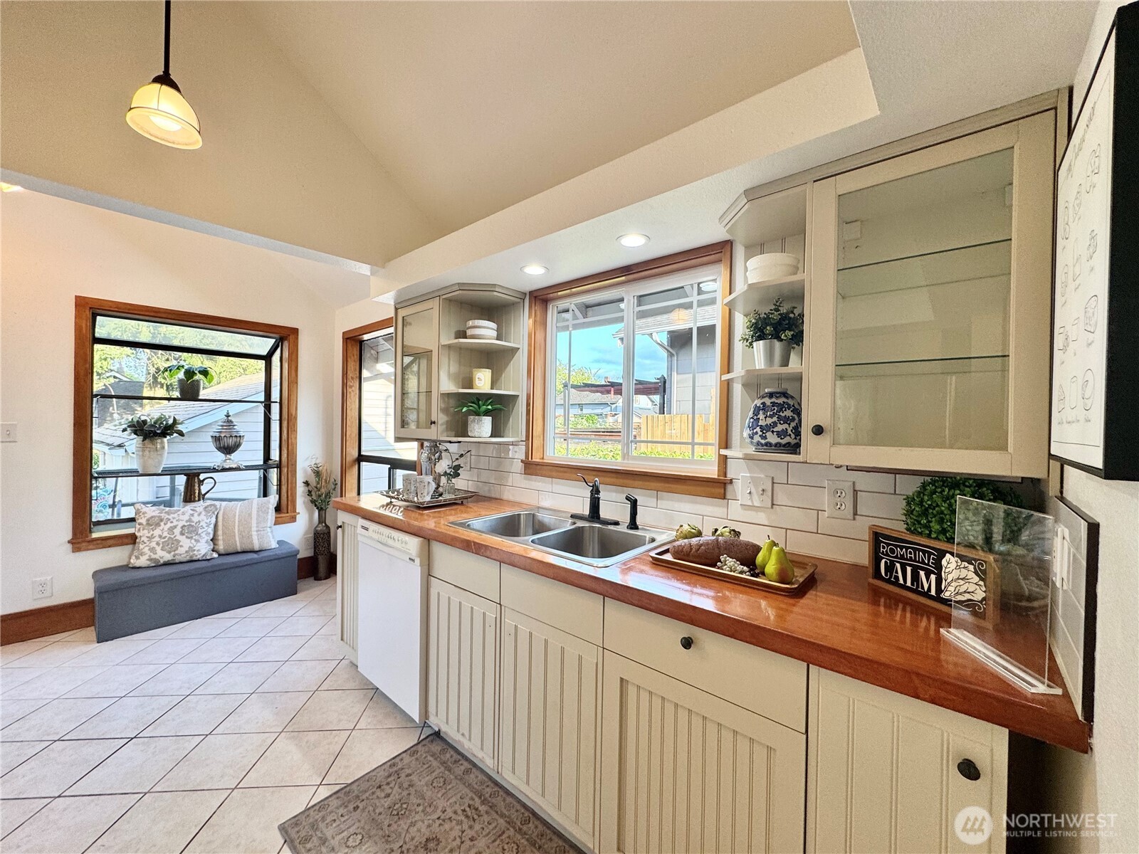 4837 South I Street Tacoma, WA 98408 - Photo 20 of 40 a kitchen with sink a stove and cabinets