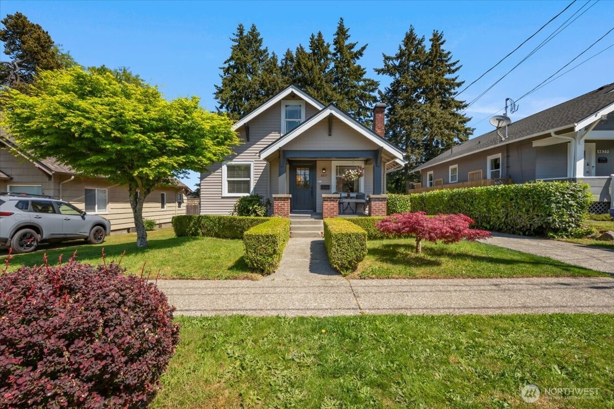 4837 South I Street Tacoma, WA 98408 - Photo 2 of 40 a view of a house with a yard