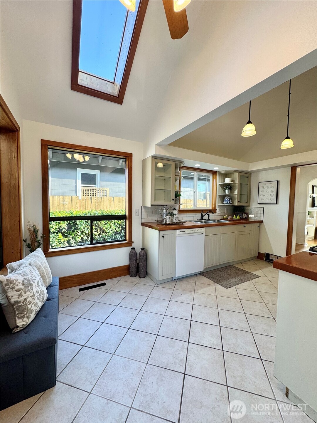 4837 South I Street Tacoma, WA 98408 - Photo 22 of 40 a large kitchen with cabinets and furniture