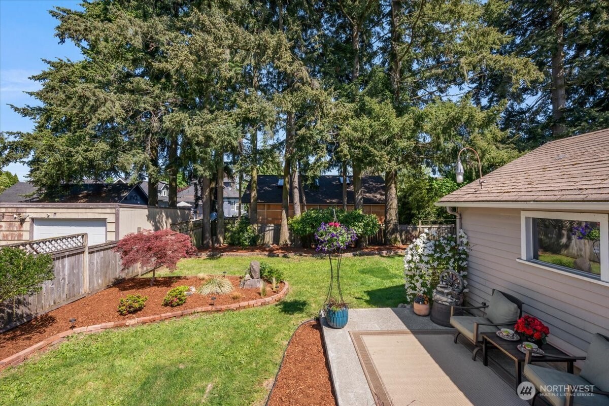 4837 South I Street Tacoma, WA 98408 - Photo 29 of 40 a view of a backyard with a garden and plants