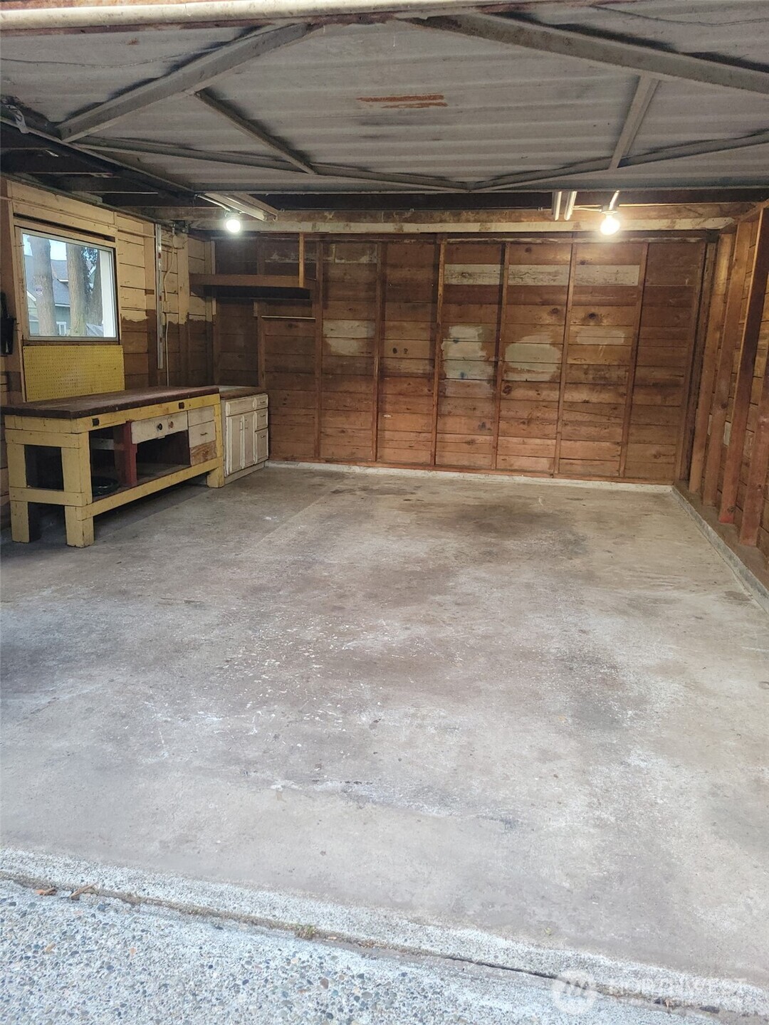 4837 South I Street Tacoma, WA 98408 - Photo 38 of 40 a view of an empty room with a garage