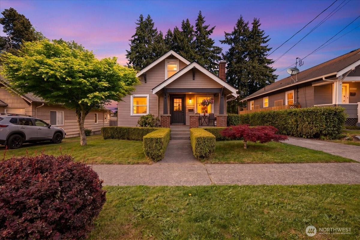 4837 South I Street Tacoma, WA 98408 - Photo 40 of 40 a front view of a house with a yard and garage