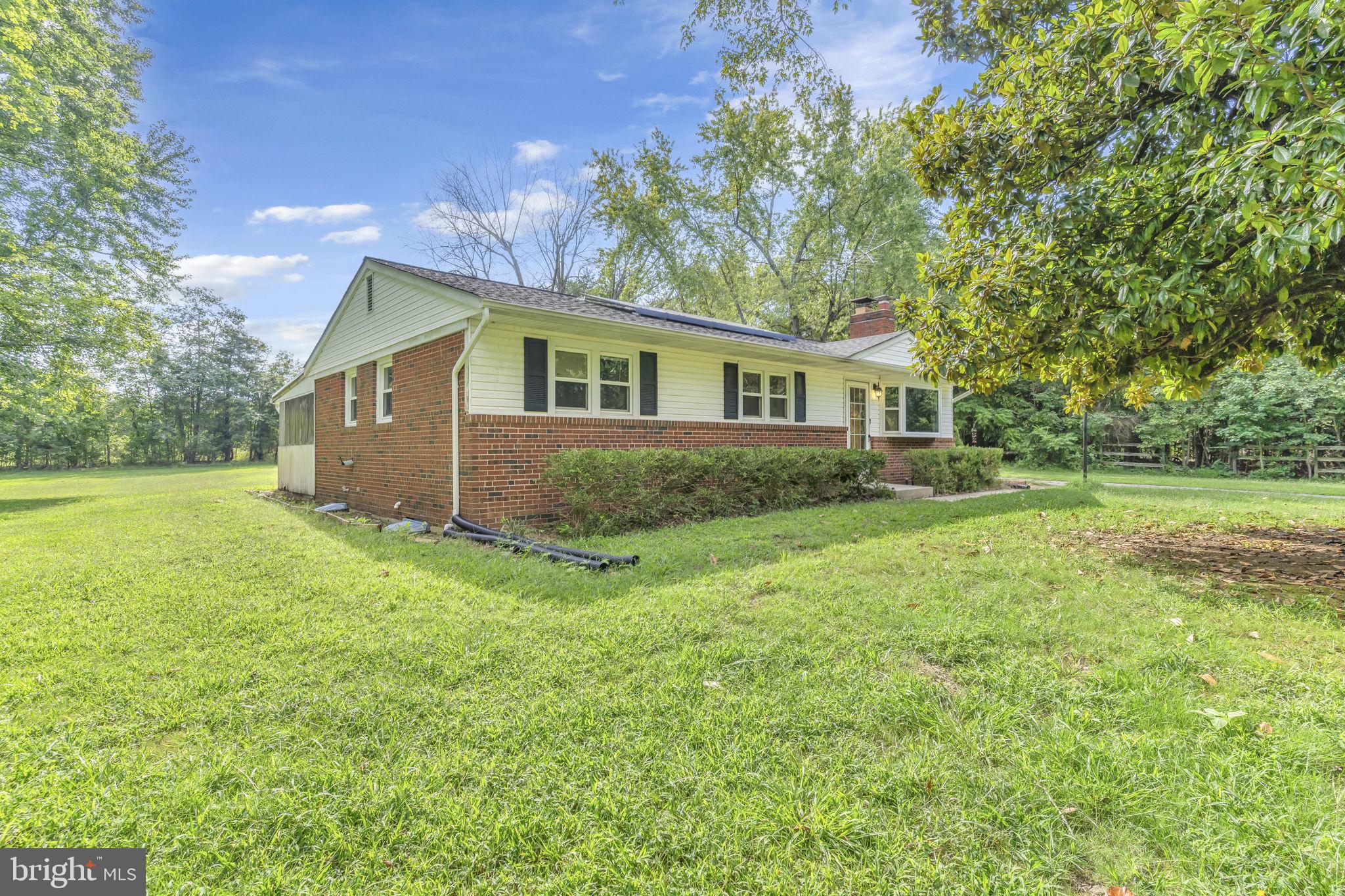 16500 Baden Naylor Road Brandywine, MD 20613 - Photo 3 of 37 a view of a house with yard and a tree