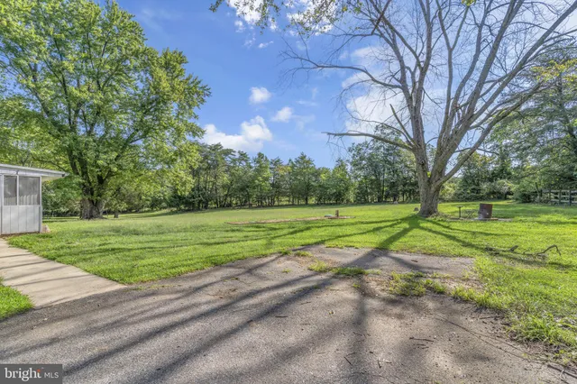 a view of a building with a big yard