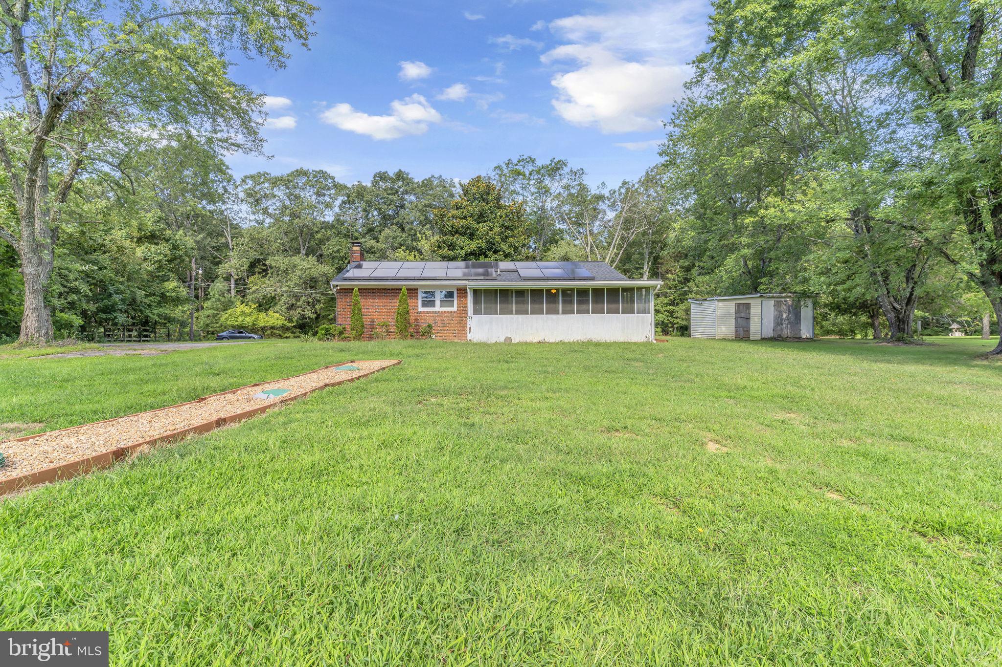 16500 Baden Naylor Road Brandywine, MD 20613 - Photo 32 of 37 a view of a house with a big yard