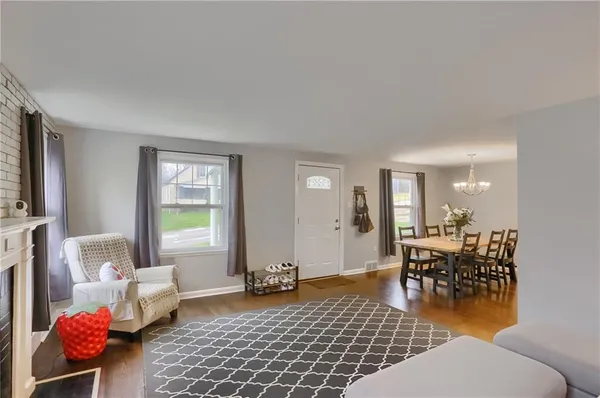 a living room with furniture and a table