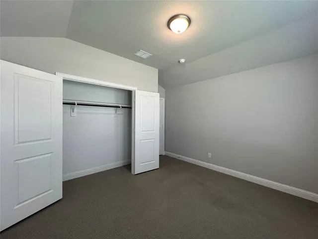 an empty room with closet
