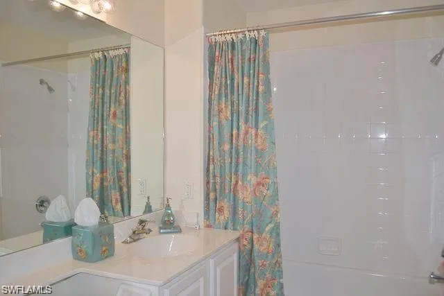 a view of a room with balcony and furniture