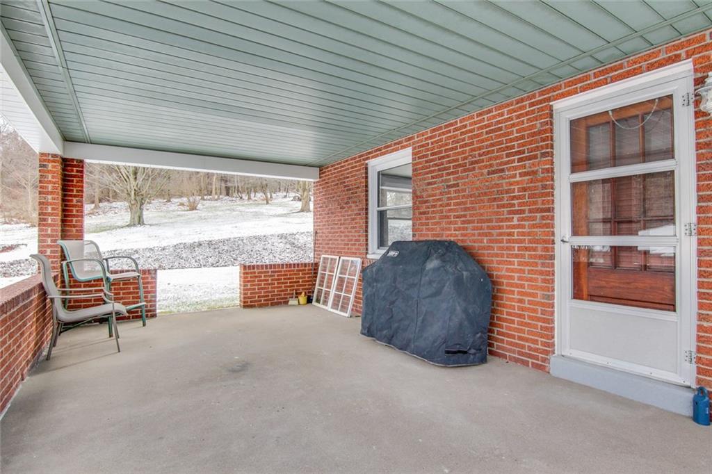 672 Center Road Pittsburgh, PA 15239 - Photo 23 of 25 Covered side porch