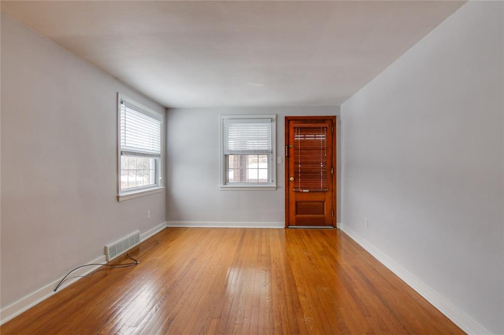 672 Center Road Pittsburgh, PA 15239 - Photo 7 of 25 Access to side porch through living room door