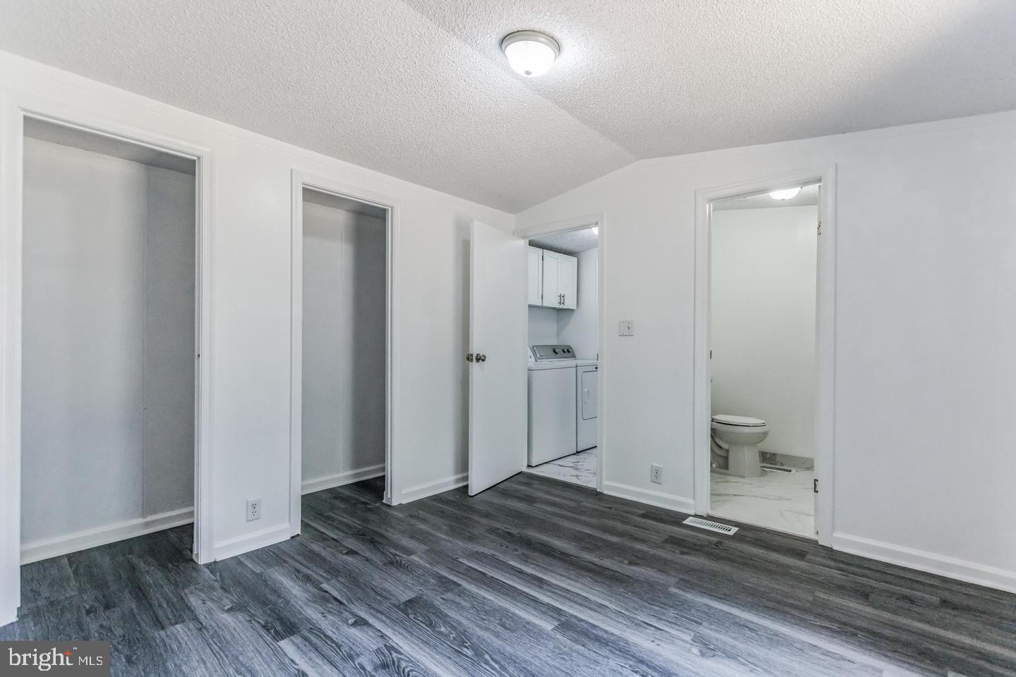 232 Jute Road Millville, NJ 08332 - Photo 20 of 30 a view of a room with wooden floor and a bathroom