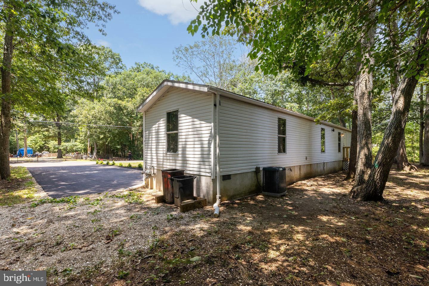 232 Jute Road Millville, NJ 08332 - Photo 28 of 30 a view of a house with a yard and tree s