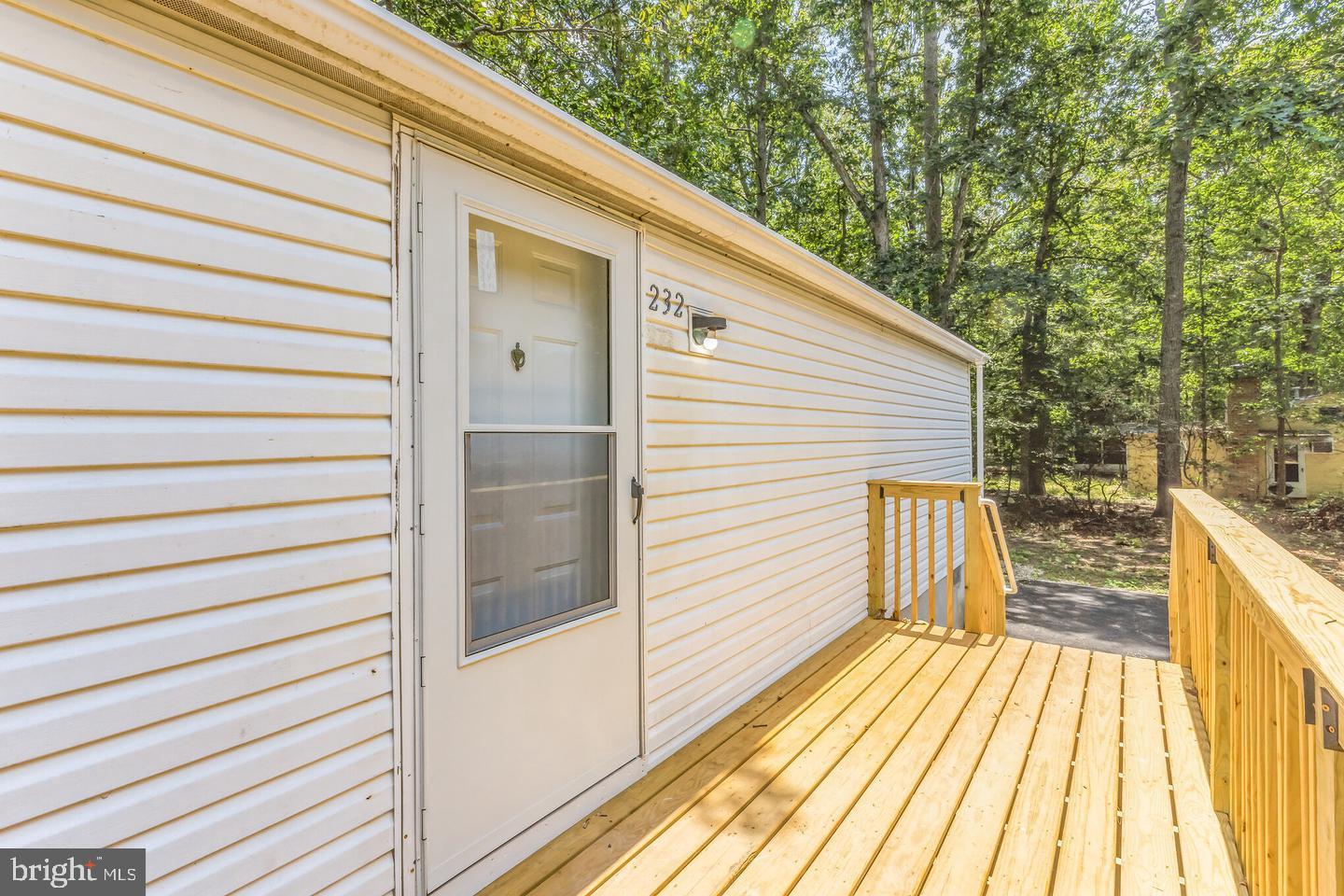 232 Jute Road Millville, NJ 08332 - Photo 6 of 30 a view of a balcony with wooden floor