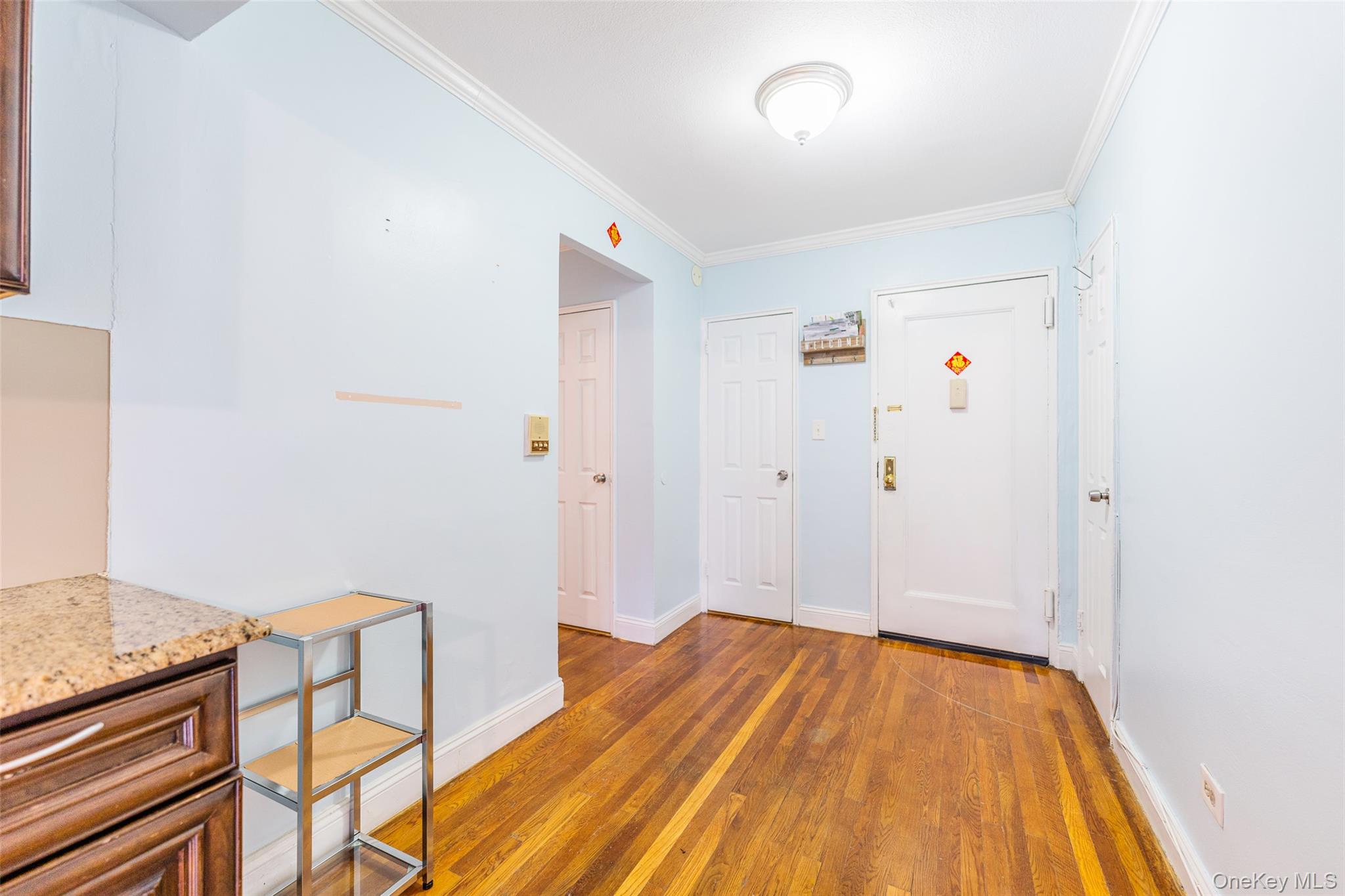 150-25 72nd Road, Unit 5K Queens, NY 11367 - Photo 11 of 21 a view of room with wooden floor