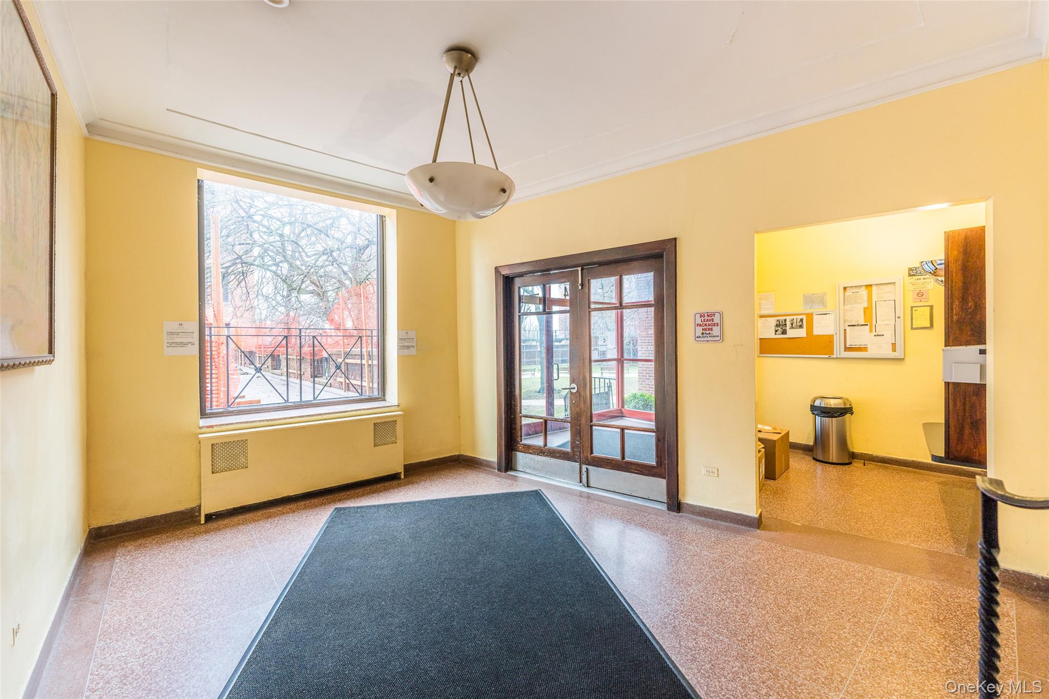 150-25 72nd Road, Unit 5K Queens, NY 11367 - Photo 17 of 21 a view of livingroom with furniture window and a livingroom