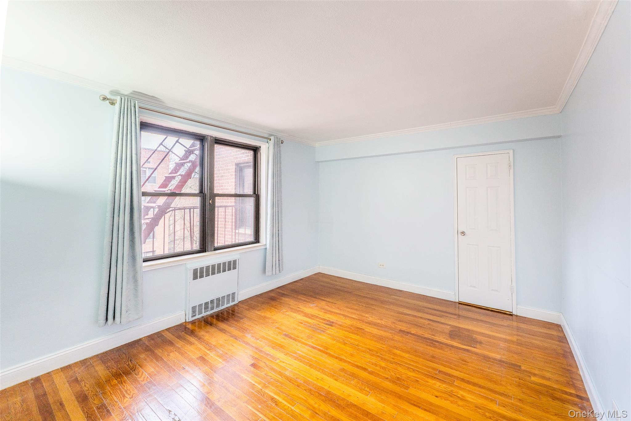 150-25 72nd Road, Unit 5K Queens, NY 11367 - Photo 7 of 21 a view of empty room with window