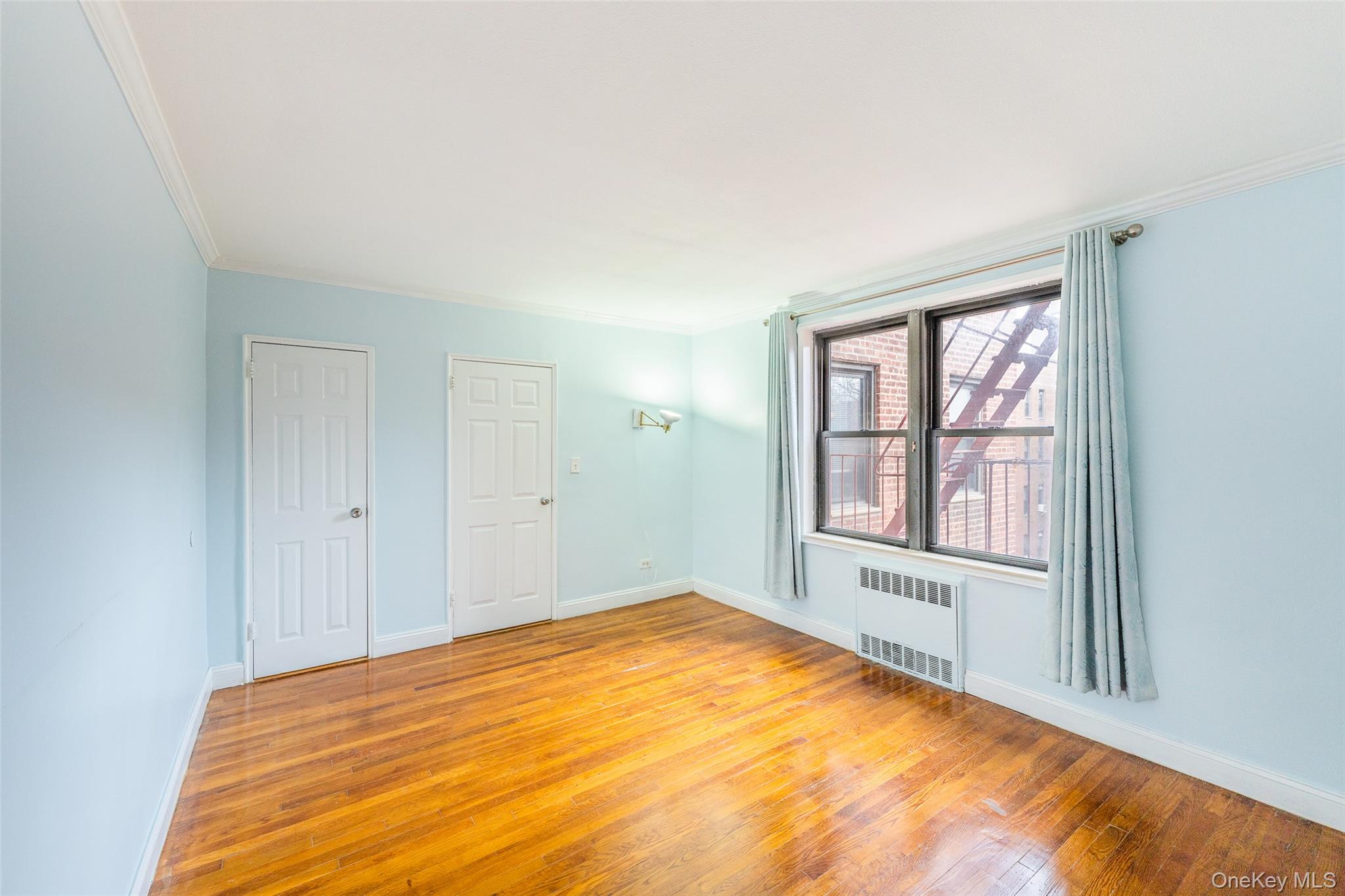 150-25 72nd Road, Unit 5K Queens, NY 11367 - Photo 8 of 21 a view of empty room with window