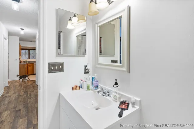 a bedroom with a bed and a television