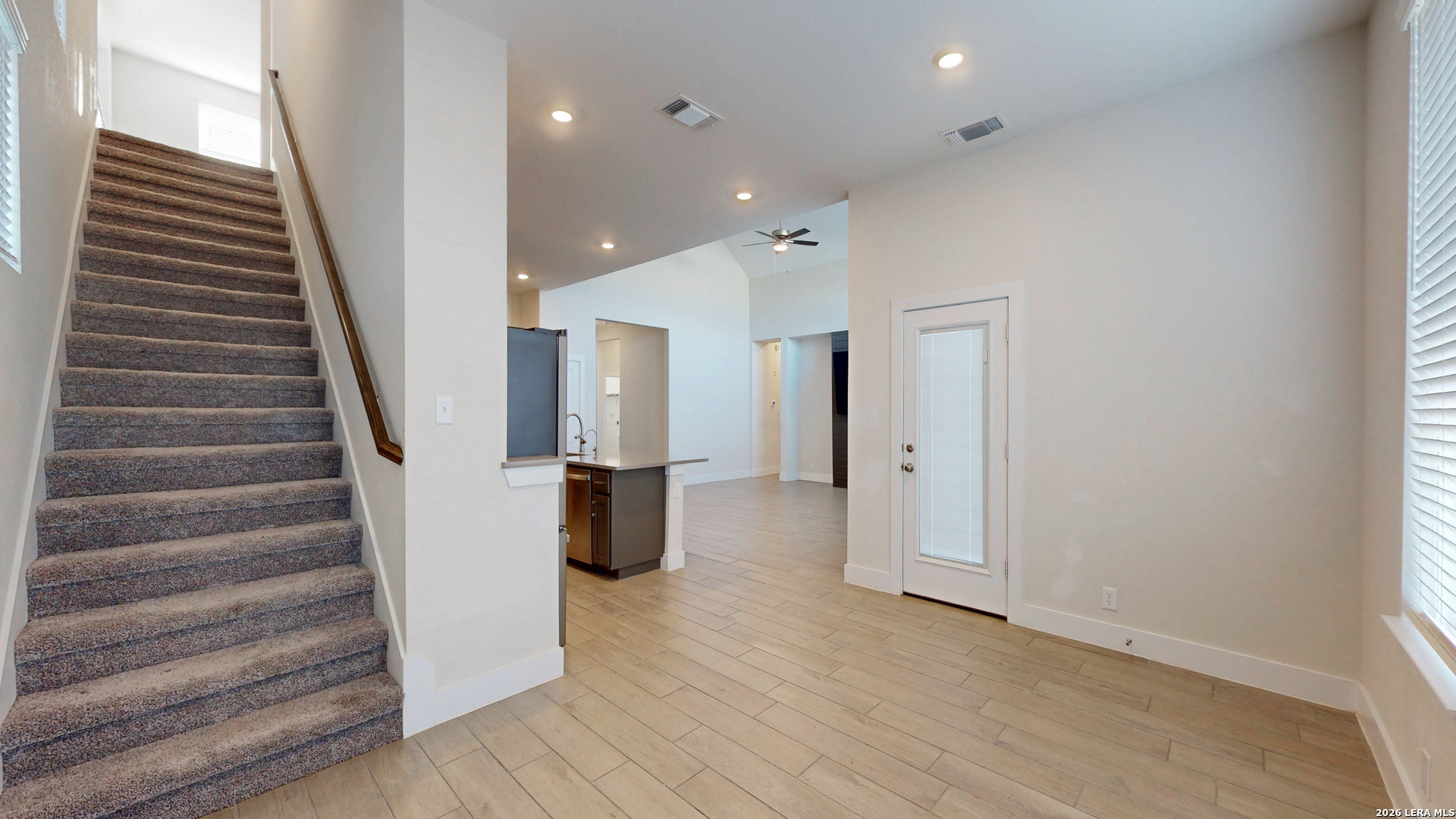 918 Rench New Braunfels, TX 78130 - Photo 27 of 41 a view of entryway with wooden floor and stairs