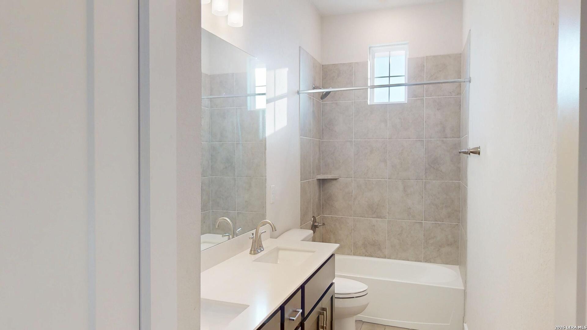 918 Rench New Braunfels, TX 78130 - Photo 33 of 41 a bathroom with a bathtub a sink and a shower