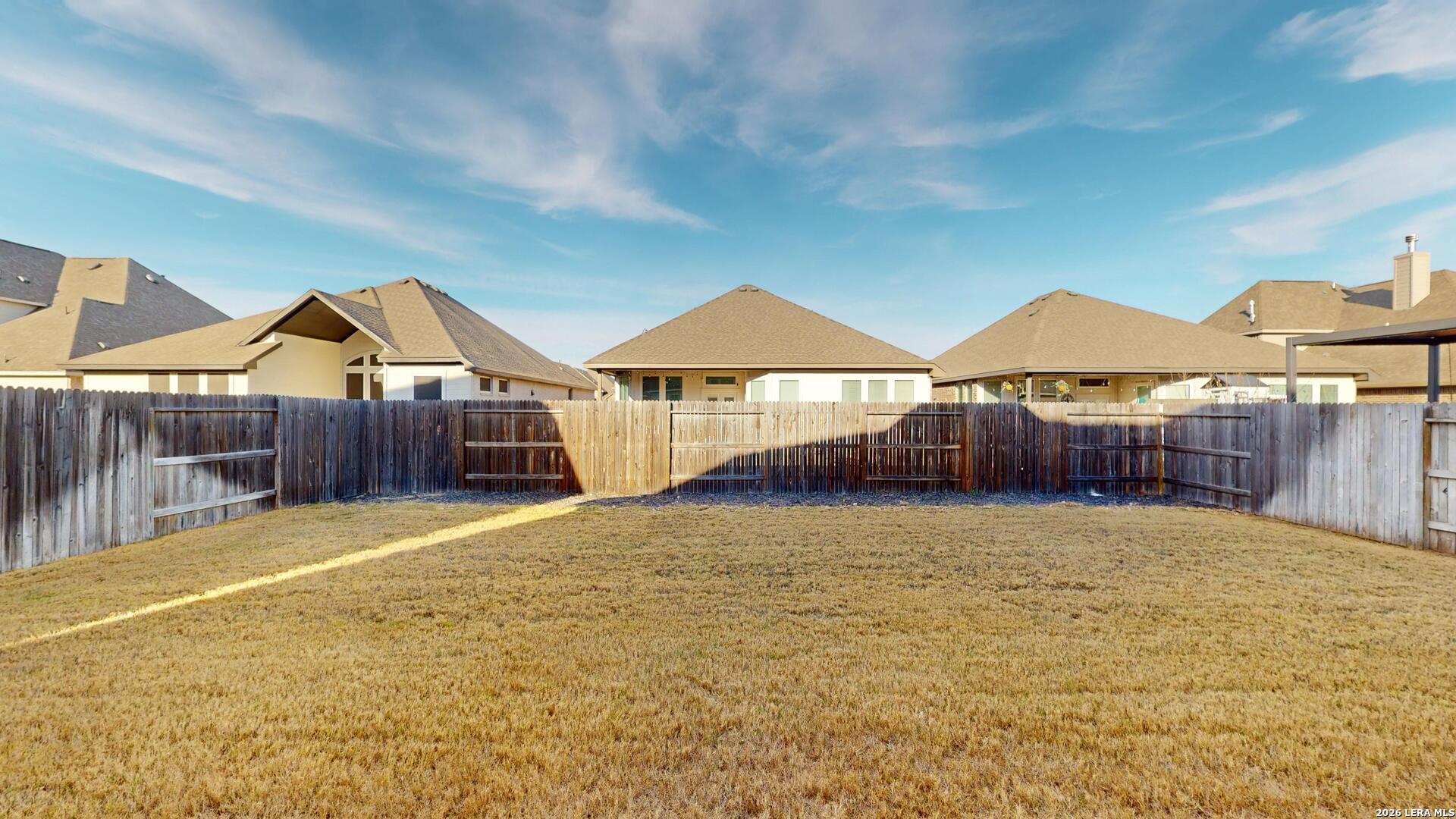 918 Rench New Braunfels, TX 78130 - Photo 36 of 41 a front view of a house with a yard and garage