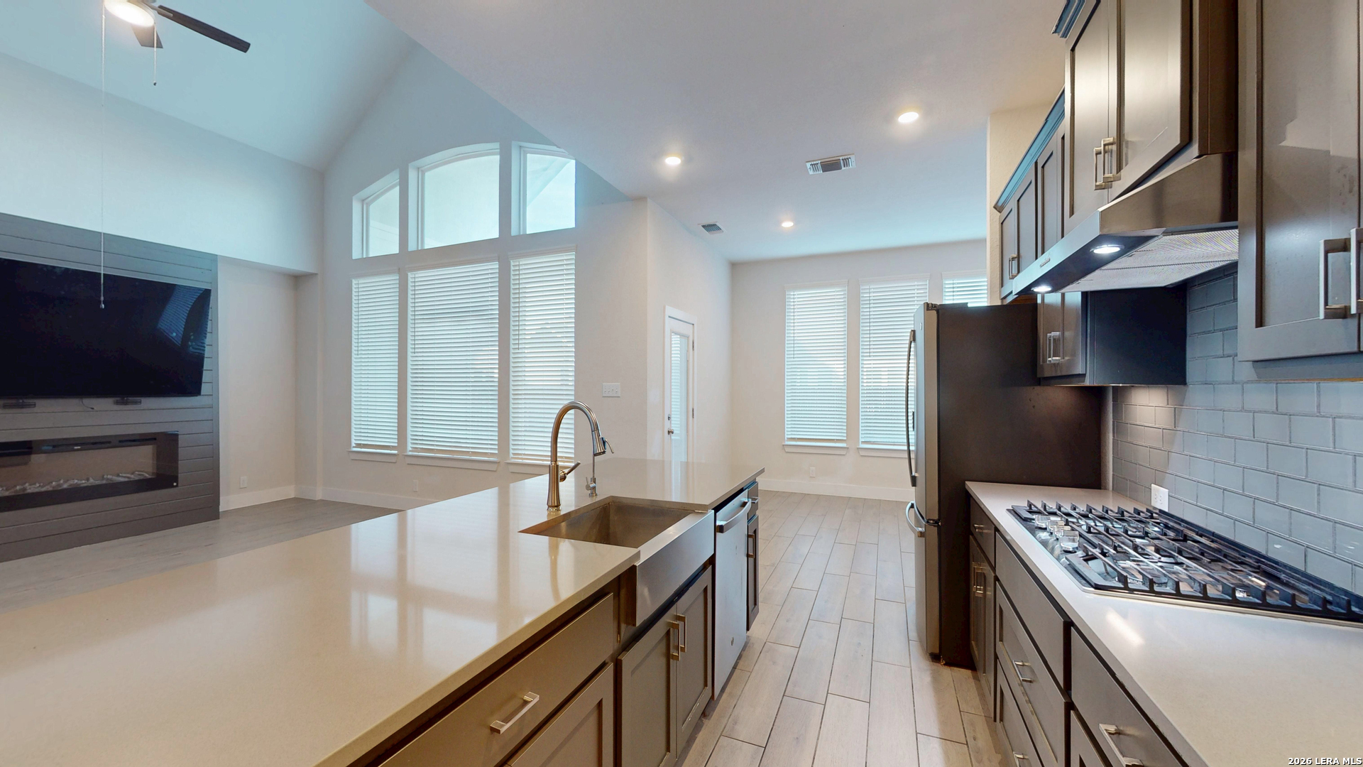 918 Rench New Braunfels, TX 78130 - Photo 9 of 41 a kitchen with stainless steel appliances granite countertop a sink stove and refrigerator