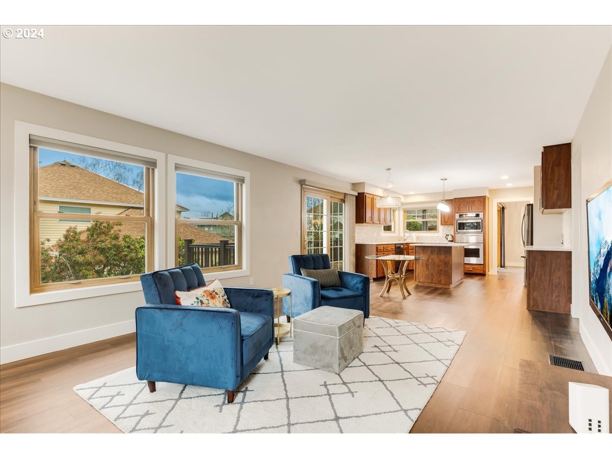 1812 Southwest Nancy Drive Gresham, OR 97080 - Photo 14 of 39 a living room with furniture and a large window