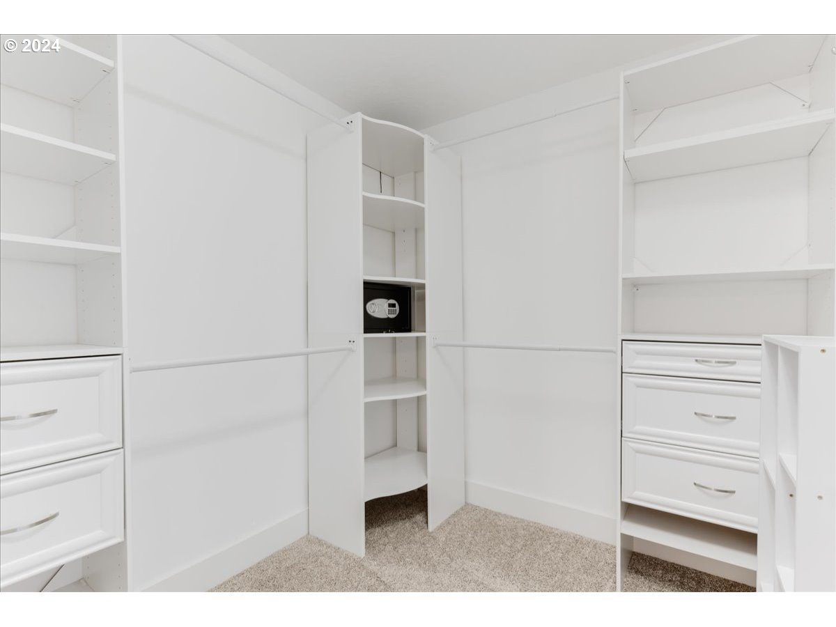 1812 Southwest Nancy Drive Gresham, OR 97080 - Photo 27 of 39 a view of walk in closet with empty racks