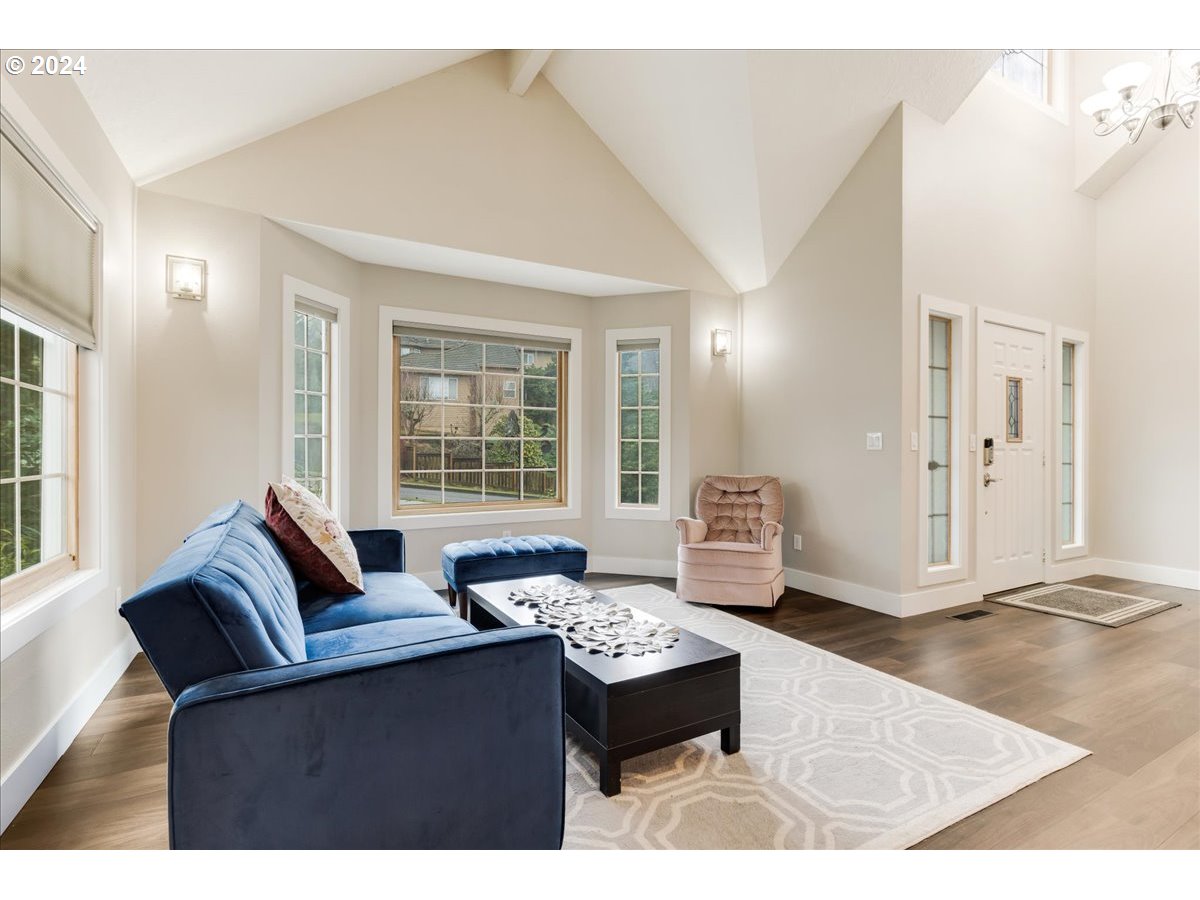 1812 Southwest Nancy Drive Gresham, OR 97080 - Photo 6 of 39 a living room with furniture and a large window