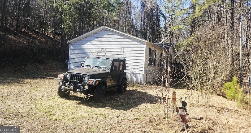 14 Whispering Springs Road Jasper, GA 30143 - Photo 1 of 1 a car parked in front of house