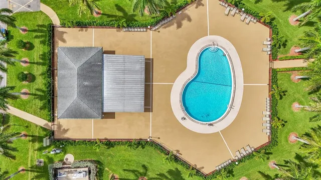 a view of houses with yard and green space