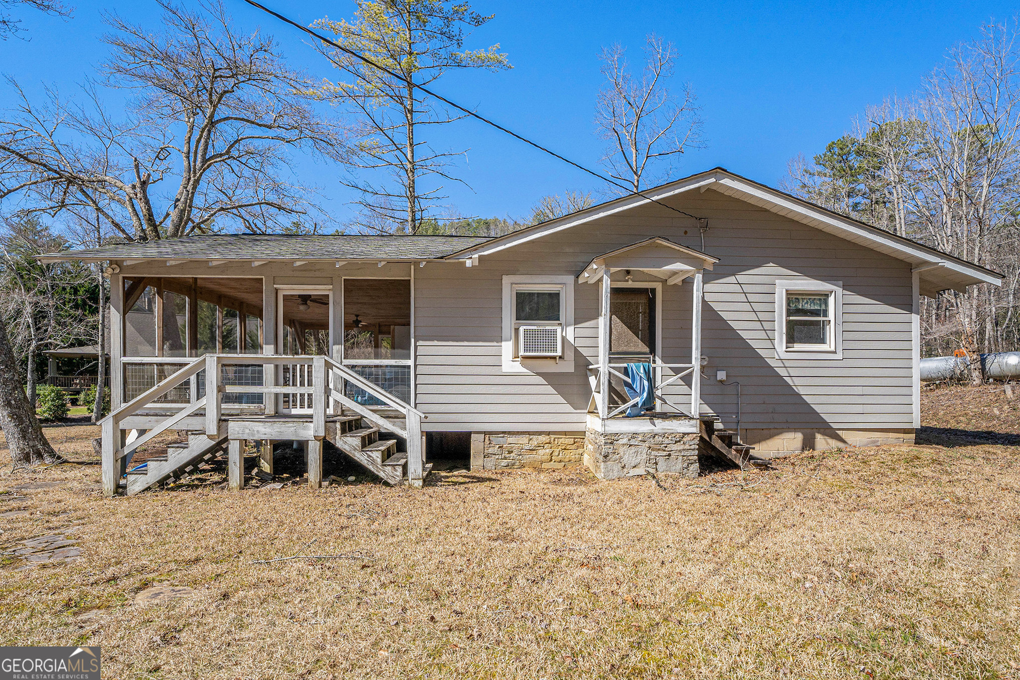 5622 Murray Cove Road Tiger, GA 30576 - Photo 25 of 39 a house view with a garden space