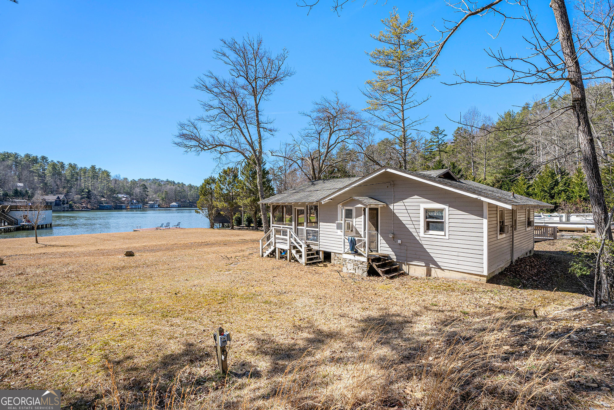 5622 Murray Cove Road Tiger, GA 30576 - Photo 27 of 39 a view of a house with a yard covered in snow