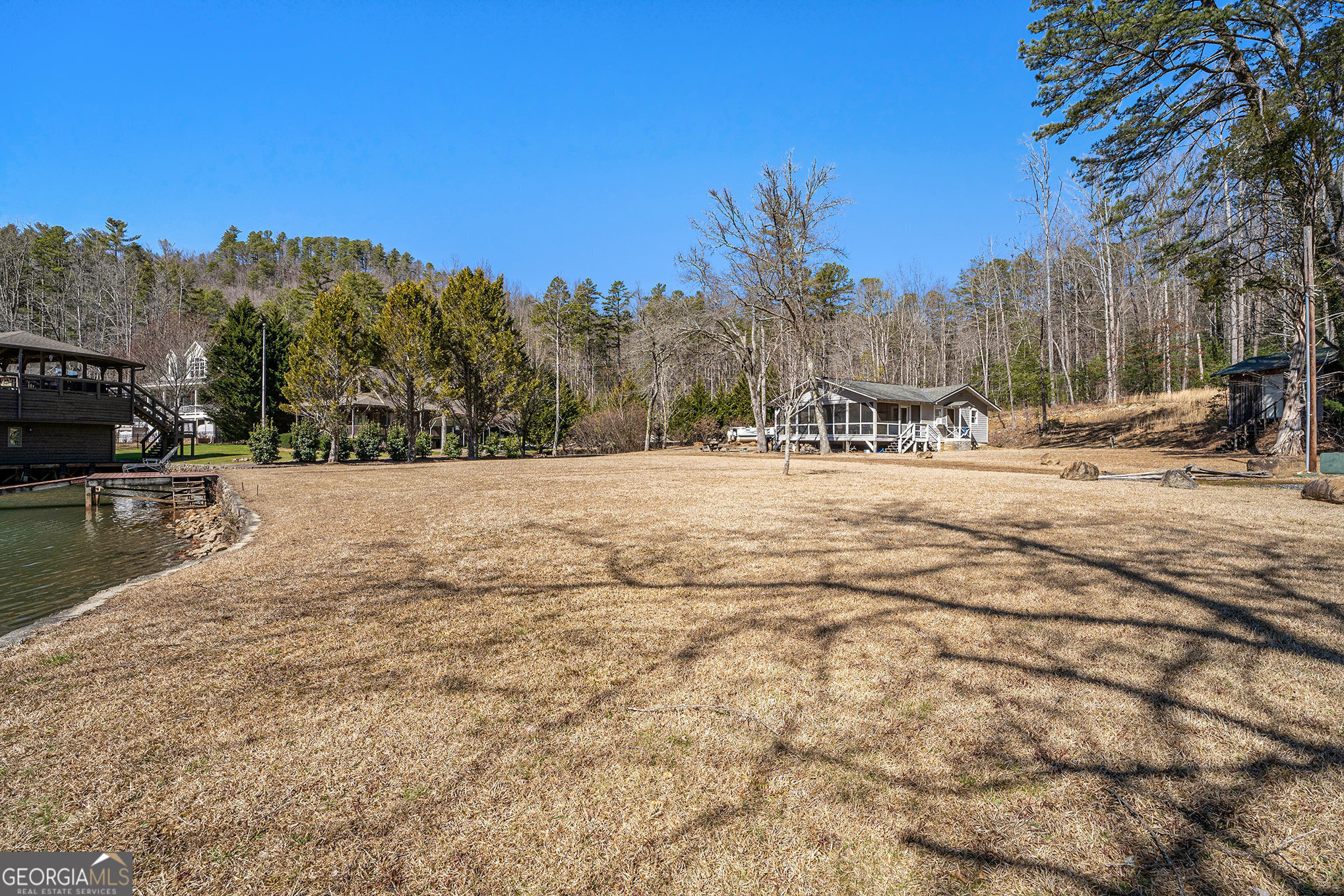 5622 Murray Cove Road Tiger, GA 30576 - Photo 33 of 39 a view of pool with trees in the background