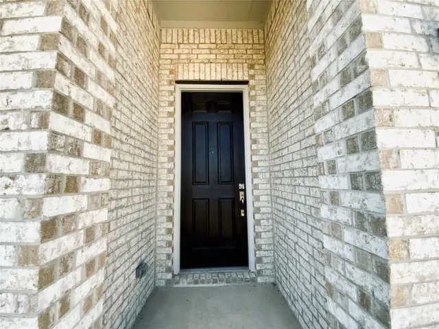 a front view of a house with a shower