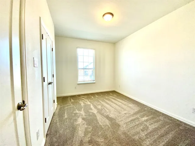 a bathroom with a double vanity sink and mirror