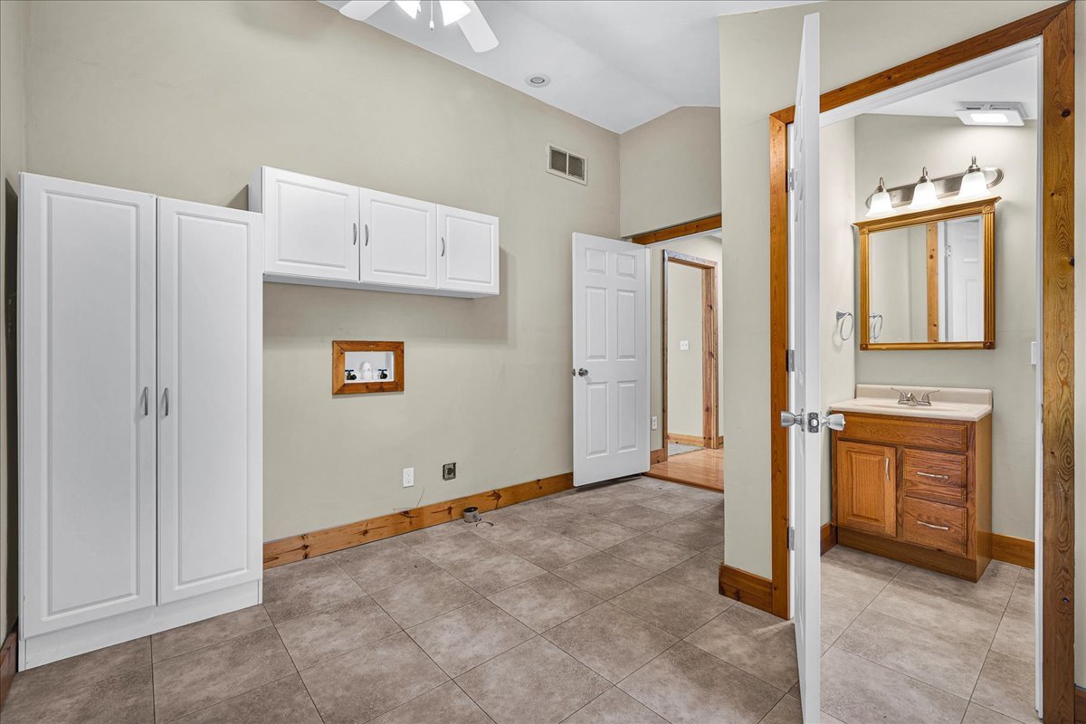 116 Lakeview Road East Galesburg, IL 61430 - Photo 21 of 36 a view of kitchen with a refrigerator and a stove top oven
