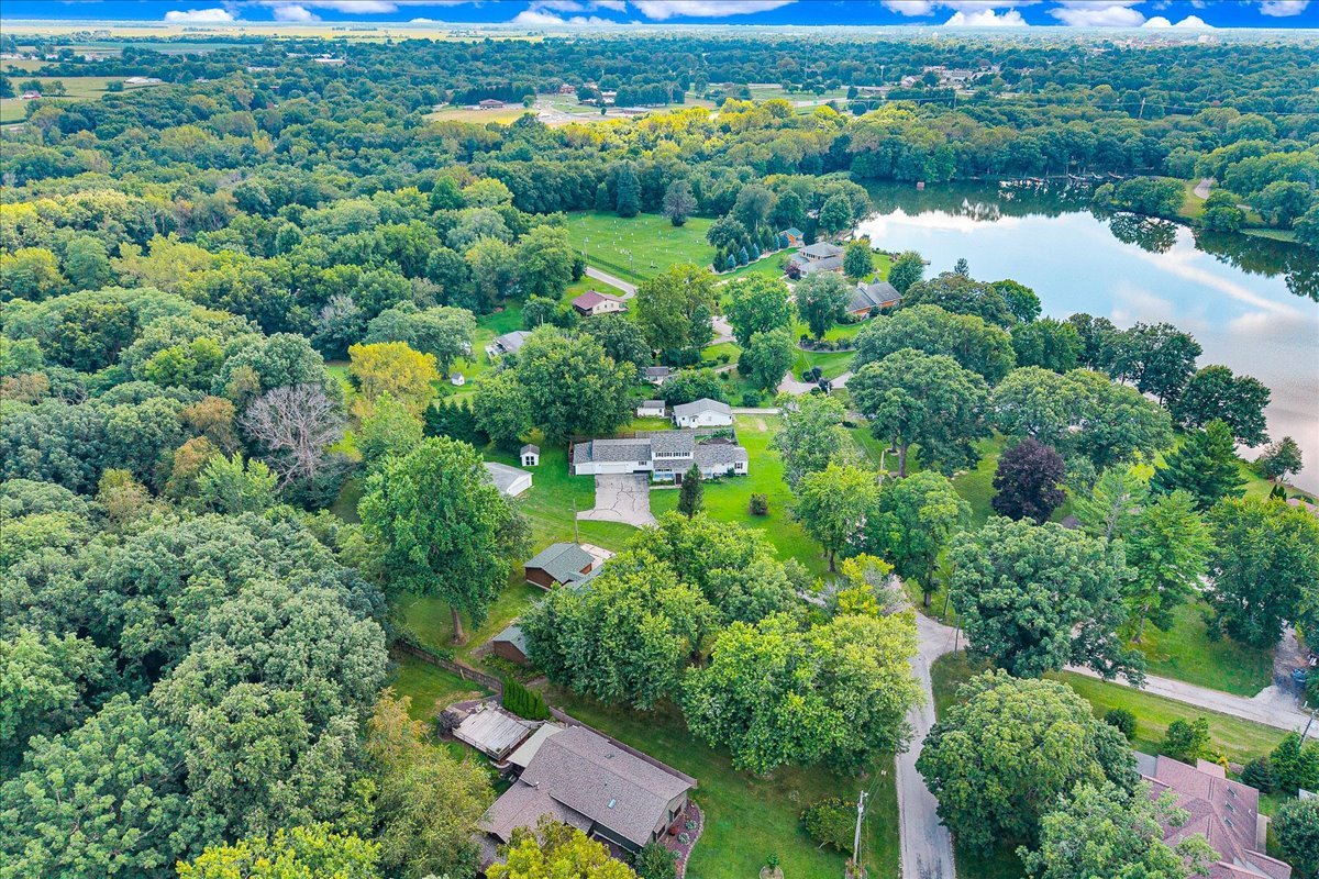116 Lakeview Road East Galesburg, IL 61430 - Photo 32 of 36 an aerial view of a house with yard and outdoor seating