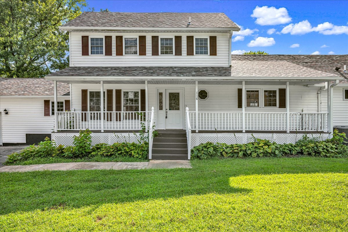 116 Lakeview Road East Galesburg, IL 61430 - Photo 34 of 36 a front view of a house with a garden