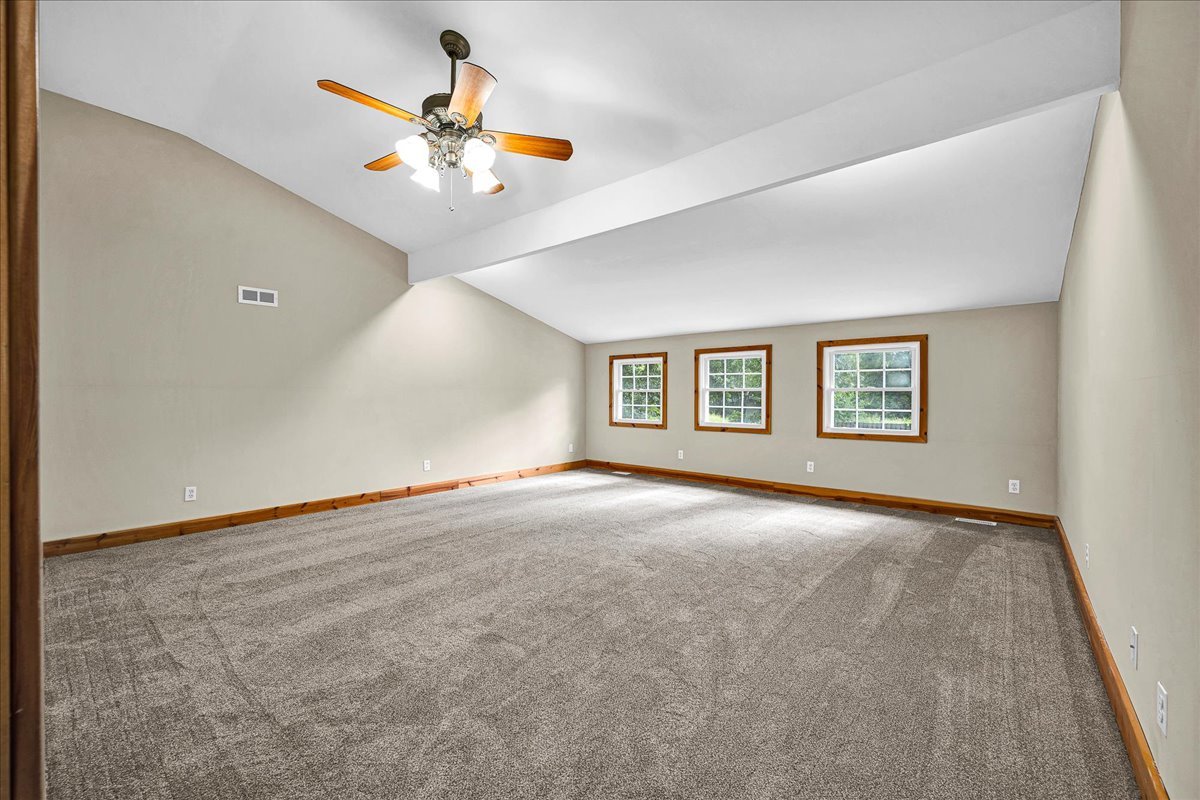 116 Lakeview Road East Galesburg, IL 61430 - Photo 6 of 36 an empty room with closet and ceiling fan