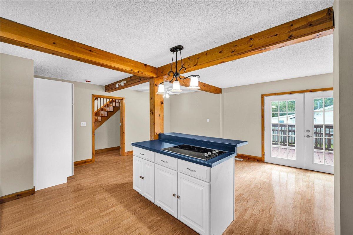 116 Lakeview Road East Galesburg, IL 61430 - Photo 9 of 36 a kitchen that has a lot of cabinets and wooden floor